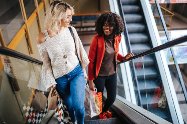 istock Friends having fun in the shopping center 1138385208