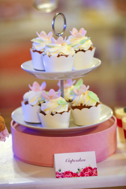 istock Candy bar with delicious cupcakes , macaroons and cake pops 1138387269