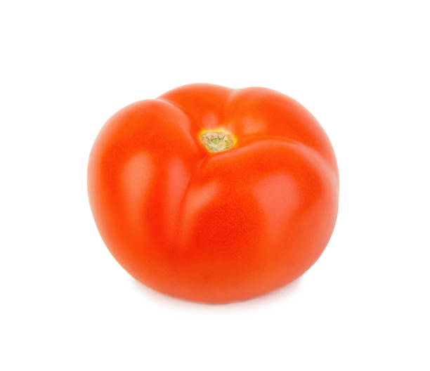istock Fresh ripe red tomato close up isolated on white 1138387844