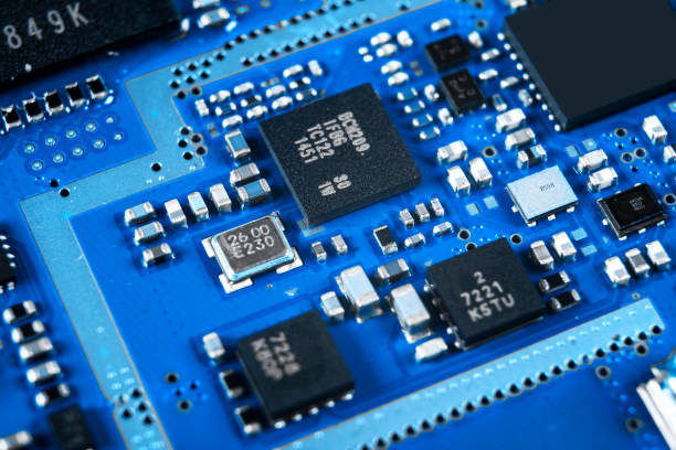 istock Macro shot of Circuit board with resistors microchips and electronic components. Computer hardware technology. Integrated communication processor. Information engineering. Semiconductor. PCB. Closeup 1138387980