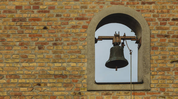 istock Tower bell of a small brick made church. 1138389227