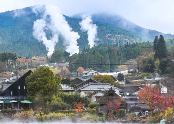 istock Yufuin town with hot spring smoke, Japan 1138389481