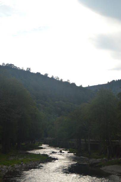 istock Suarna River Calm On Its Pass By A Navia De Suarna At Sunset. 1138391991
