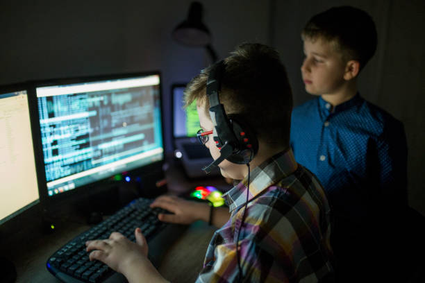 istock Two boys playing online games 1138392262