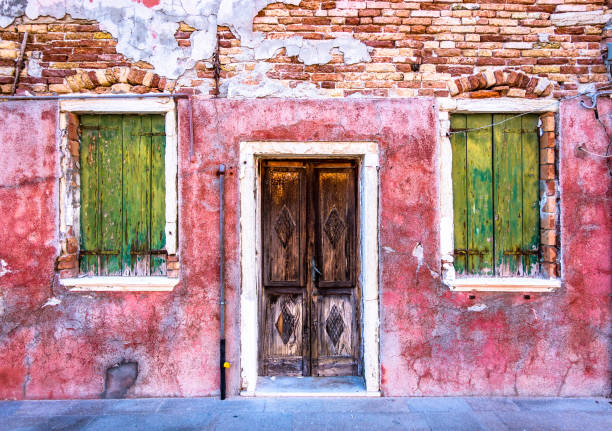 Ancient venetian water pump on Murano island, Venice, Italy