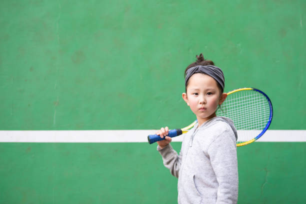 istock Girl practicing tennis 1138392584