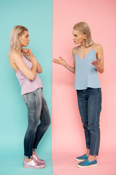 Joyless young female people arguing