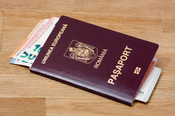 istock Foreign passports and money 1138394216