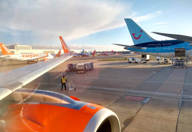 View from airbus cabin window before taking off from London's busy Gatwick airport Inside an aircraft waiting for takeoff at Gatwick airport. gatwick airport photos stock pictures, royalty-free photos & images