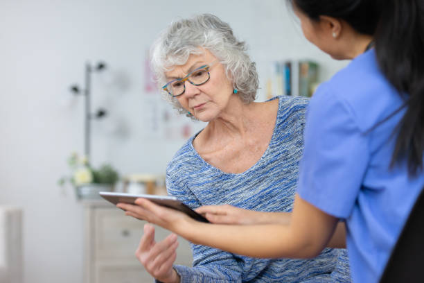 istock Senior woman looking at tablet 1138394987