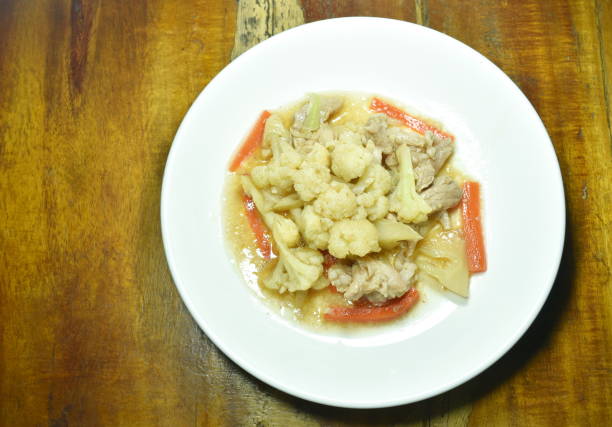 istock stir fried cauliflower with carrot and pork 1138395103