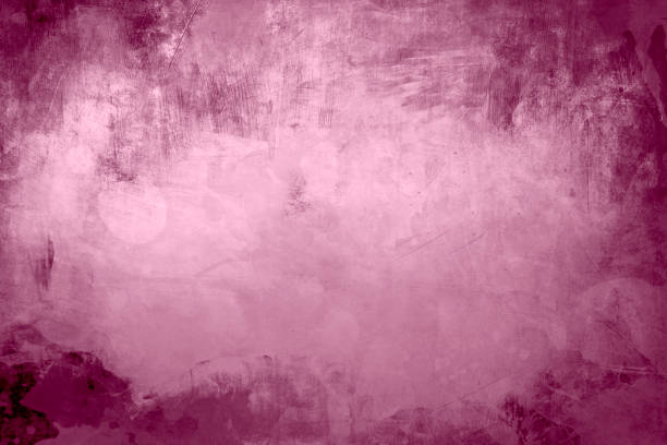 istock pink grungy background with spotlight background 1138395412
