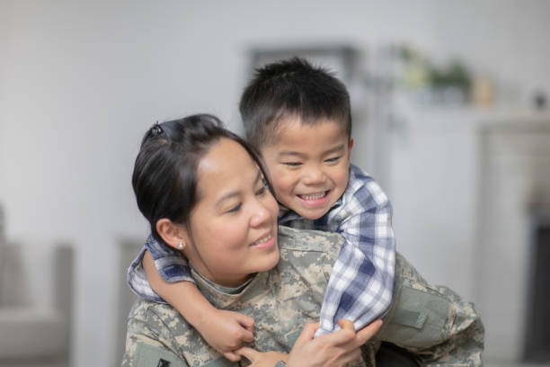istock Military Mom Hugging Her Son 1138396642