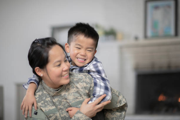 istock Military Mom Hugging Her Son 1138396646