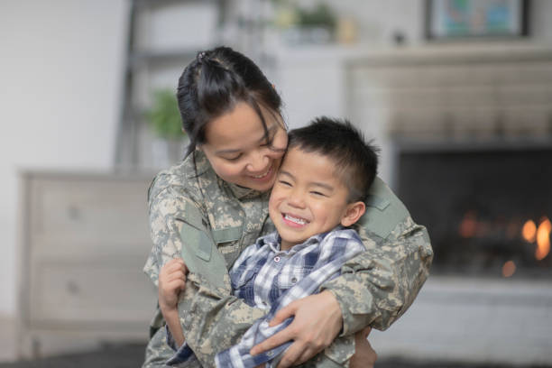 istock Military Mom Hugging Her Son 1138396647