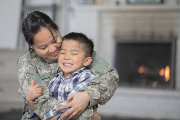 istock Military Mom Hugging Her Son 1138396650