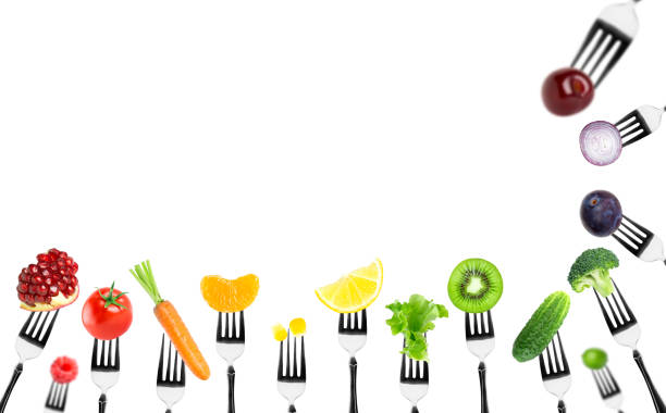 istock Fruits and vegetables on the forks 1138397006
