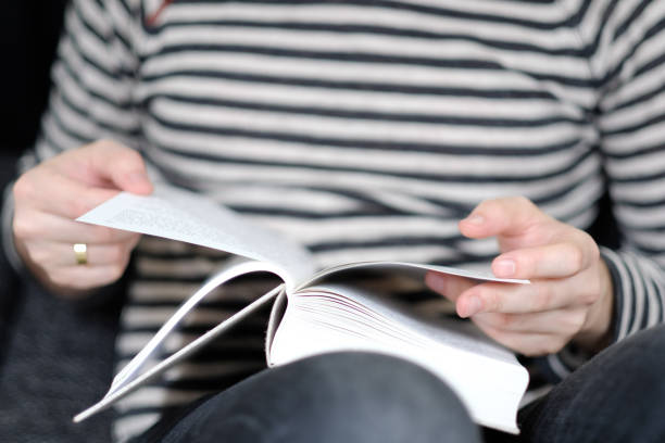istock A man with a book in his hands 1138397361