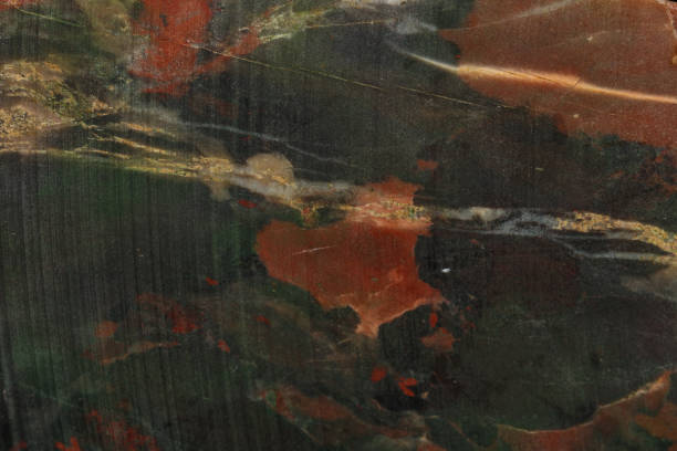 istock macro stone mineral jasper on black background 1138398757