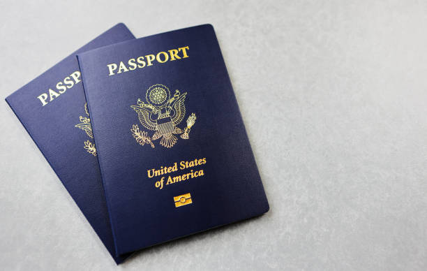 istock Two United States Passports On Textured Background 1138399772