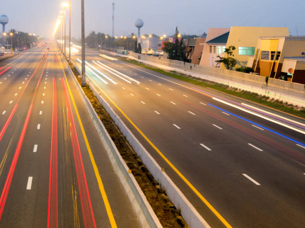 istock Motion light from truck and car on the Interstate Highway 1138399908