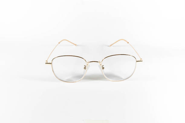 istock Gold frame spectacles glasses in a white isolated background 1138400305