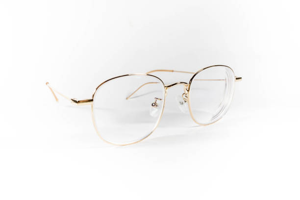 istock Gold frame spectacles glasses in a white isolated background 1138400318