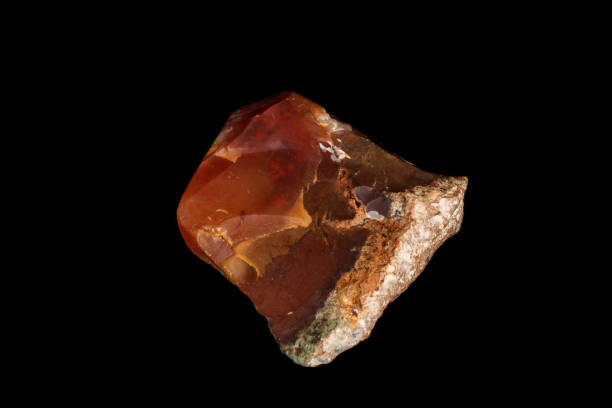 istock macro stone Carnelian mineral on a black background 1138400629