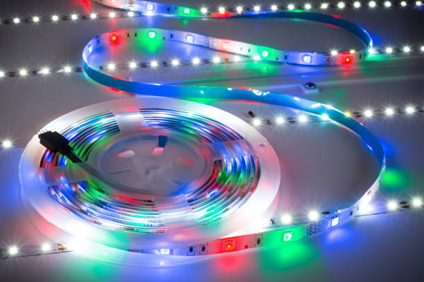 rgb led light strip on white table plate background - patch of light imagens e fotografias de stock