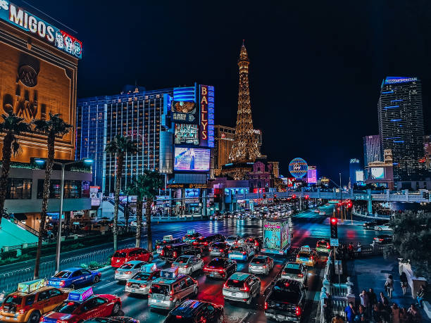 Las vegas strip The Las Vegas strip at night with cars lined up on the road las vegas photos stock pictures, royalty-free photos & images