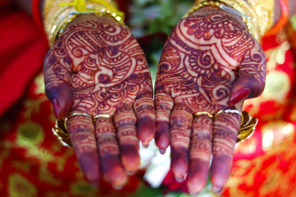 istock Indian Bride Mehandi Design on their hand for weddings 1138403854