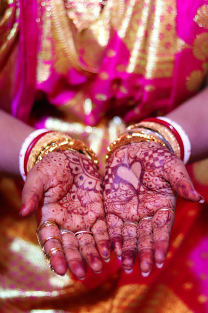 istock Indian Bride Mehandi Design on their hand for weddings 1138403896