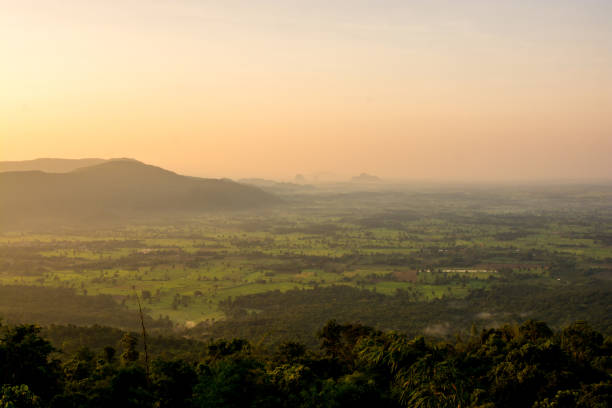 istock scenery during sunrise time with mountain and savannah field 1138405443