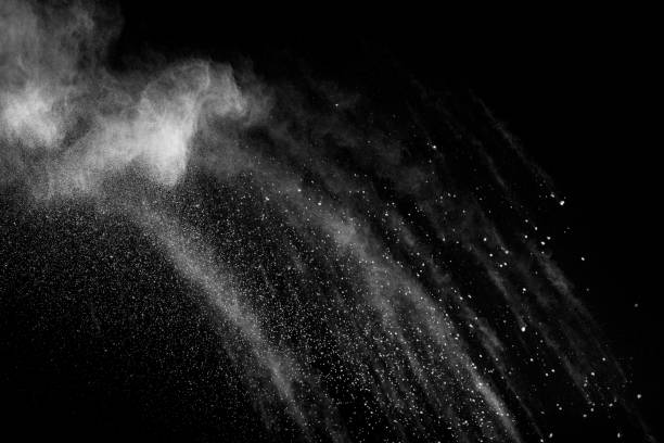 istock White powder explosion.Freeze motion of white dust particles on black background. 1138405824