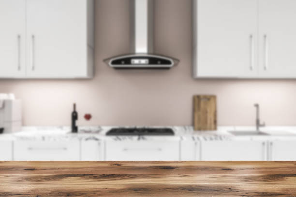 istock White countertops in beige kitchen blur 1138406660