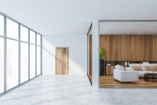 istock Corridor and lounge area in white office 1138407512