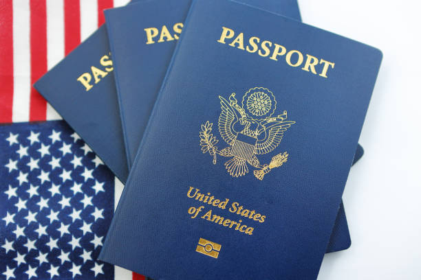 istock American Flag With USA Passport 1138407713
