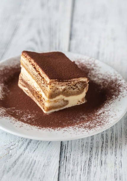 istock Portion of tiramisu on the white plate 1138408347