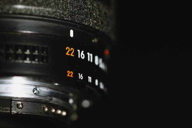 istock Camera lens with aperture numbers on a black background 1138412446