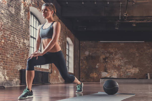 istock Young athletic girl on training in the loft 1138413256