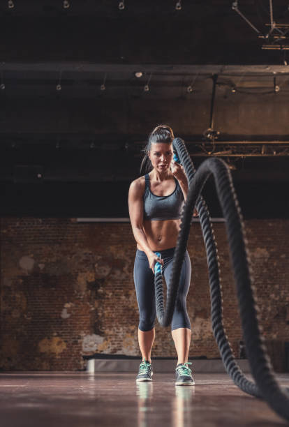istock Young sporty woman at workout 1138413269