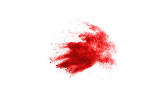 istock Freeze motion of red powder exploding, isolated on white background. Abstract design of red dust cloud. Particles explosion screen saver, wallpaper 1138417761