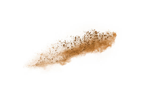 istock Brown color powder explosion on white background. Colored cloud. Colorful dust explode. Paint Holi. 1138417902