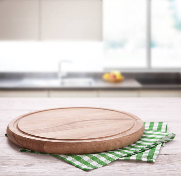 istock Kitchen towel on wooden table. Napkin close up top view mock up for design. Kitchen rustic background. 1138419667