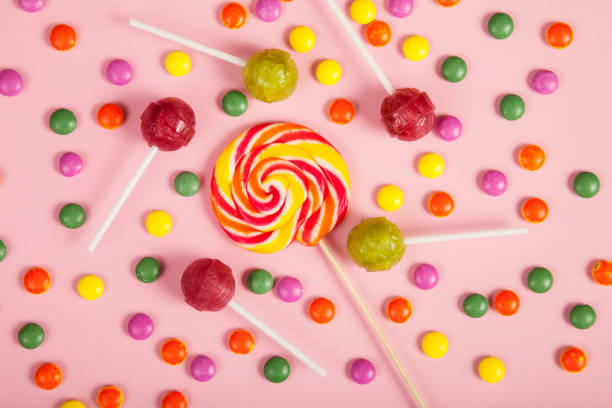 istock Colorful lollipops and different colored round candy. Top view. 1138422107