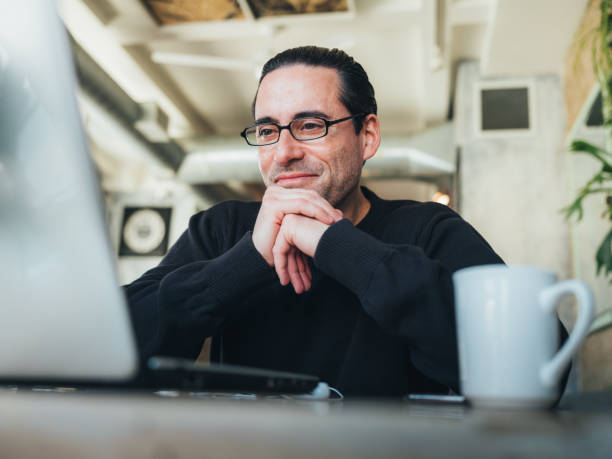 istock Caucasian man having a break at the small bistro 1138424119