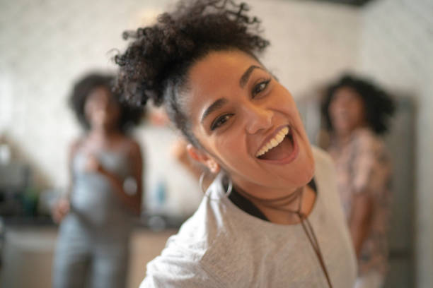 istock Friends dancing and having fun at kitchen 1138425080