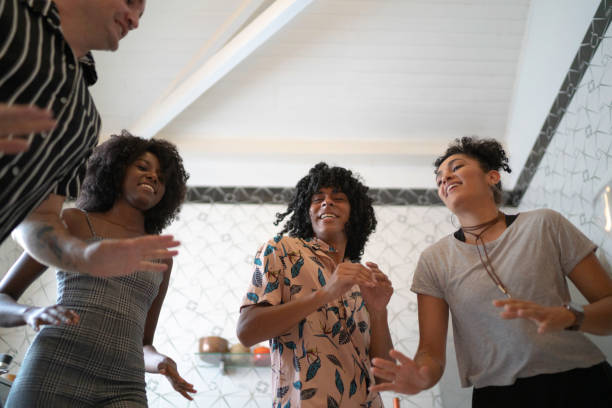 istock Friends dancing and having fun at kitchen 1138425153