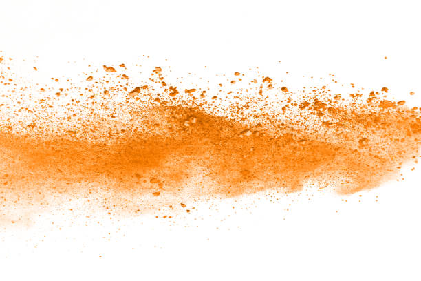 istock abstract orange powder splatted background,Freeze motion of color powder exploding/throwing color powder,color glitter texture on white background. 1138425186