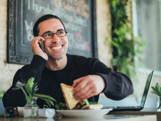 istock Caucasian man having a break at the small bistro 1138425302
